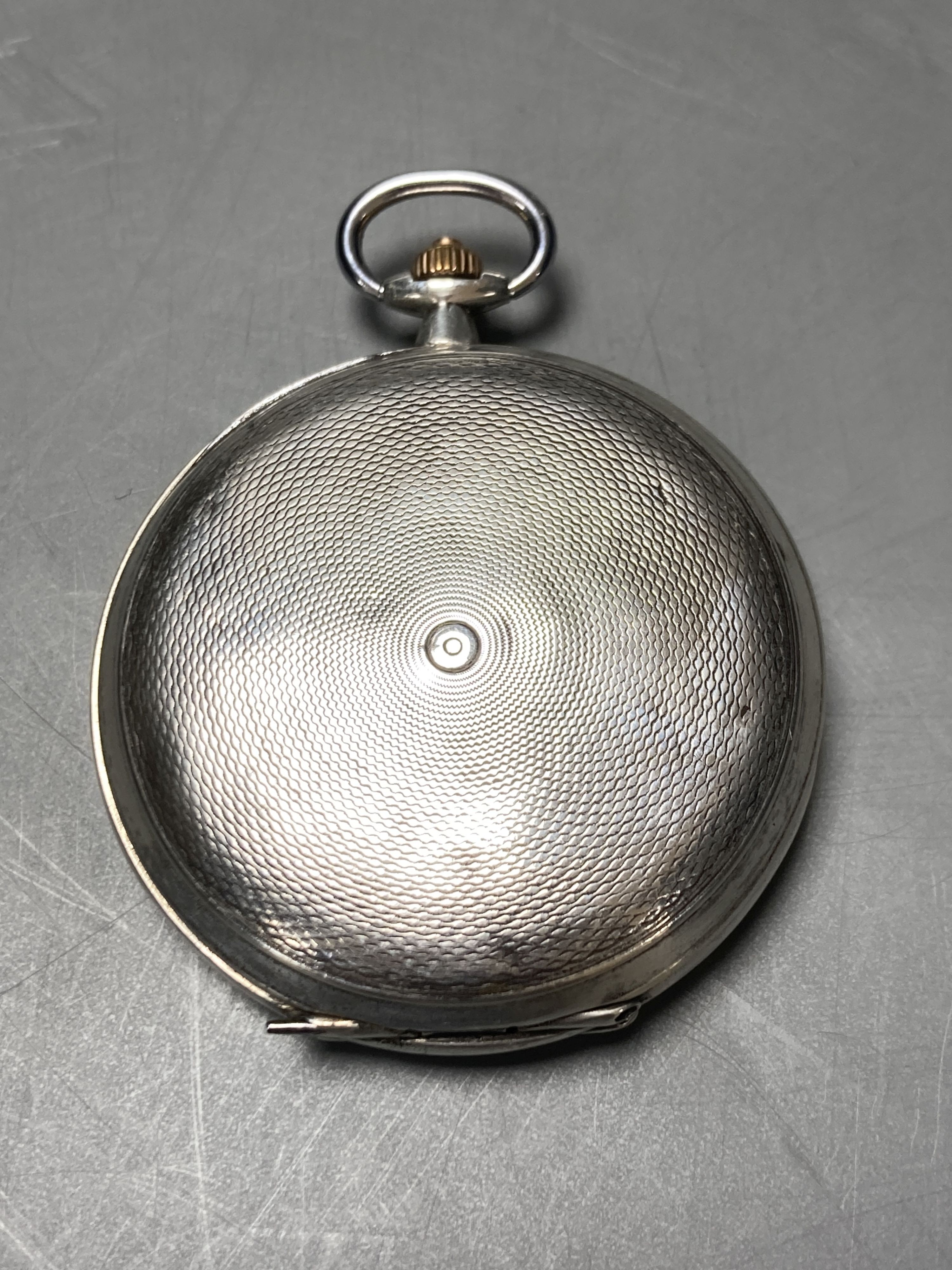 An Omega keyless silver hunter pocket watch in 900 standard case, lid associated.